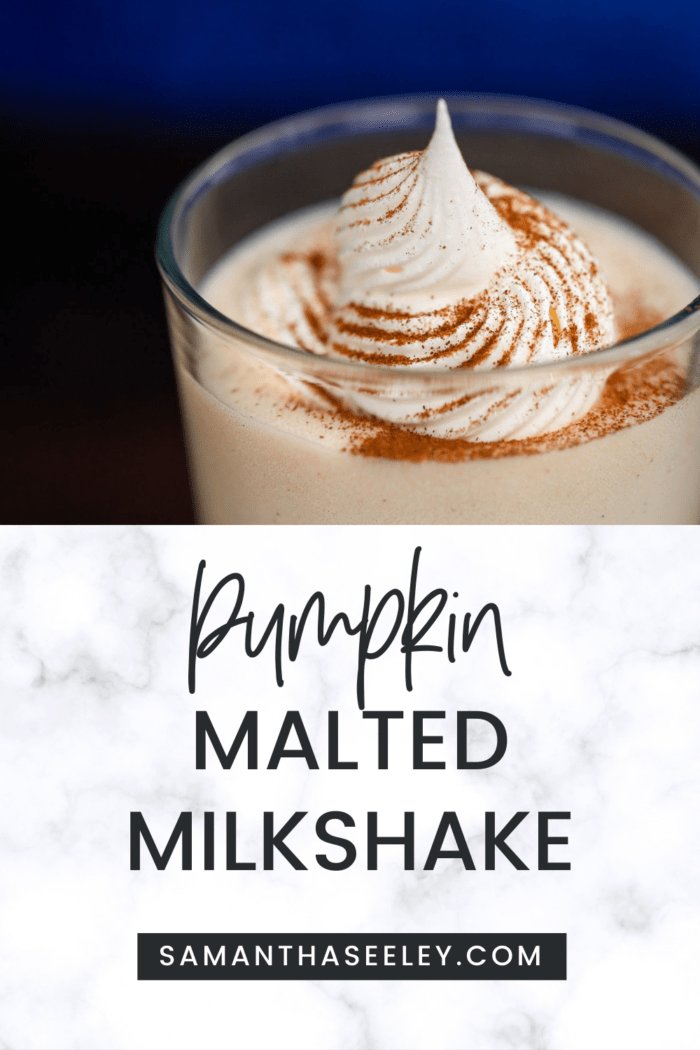 pumpkin milkshake with whipped cream and cinnamon sprinkled on top