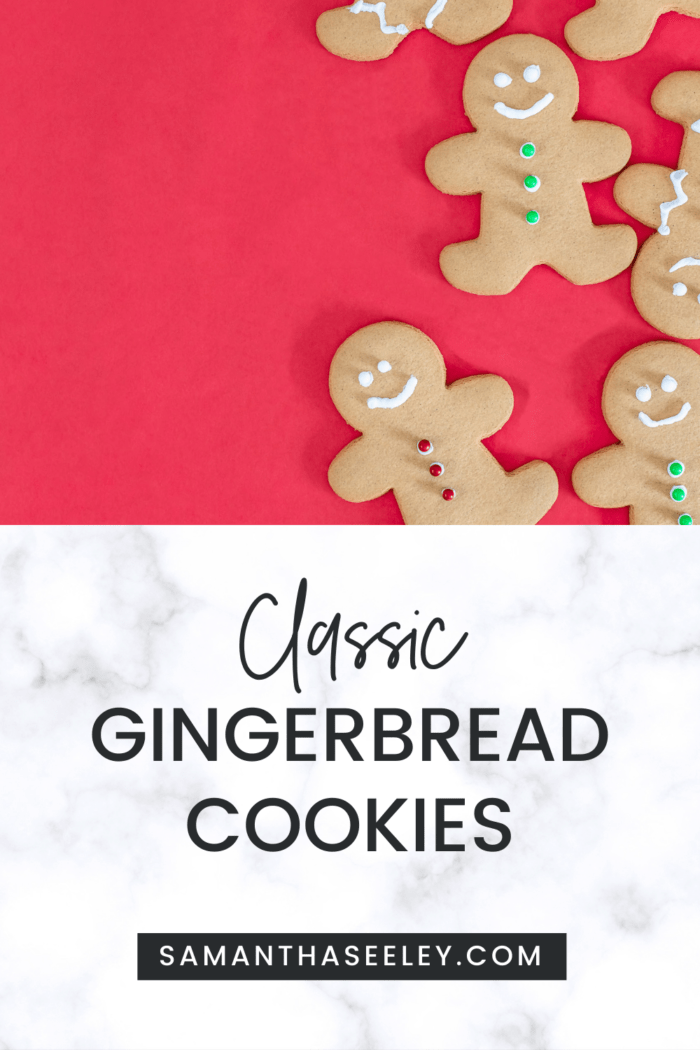 gingerbread men cookies on red surface with red and green buttons