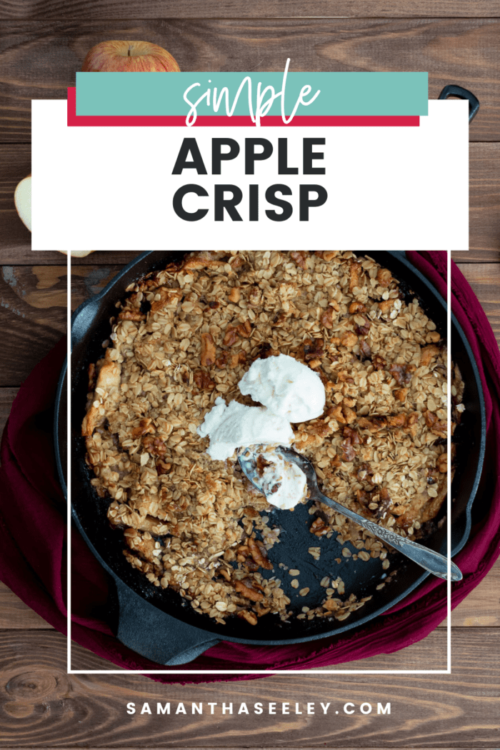 apple crisp in cast iron skillet with ice cream