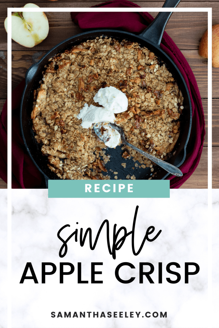 apple crisp in cast iron skillet with ice cream