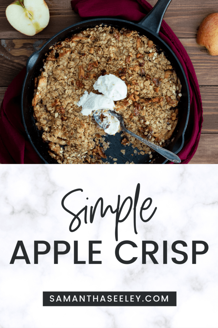 apple crisp in cast iron skillet with ice cream