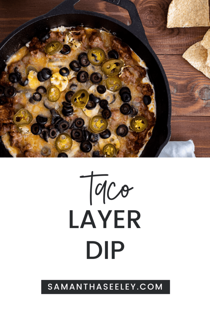 taco dip with olives and jalapenos